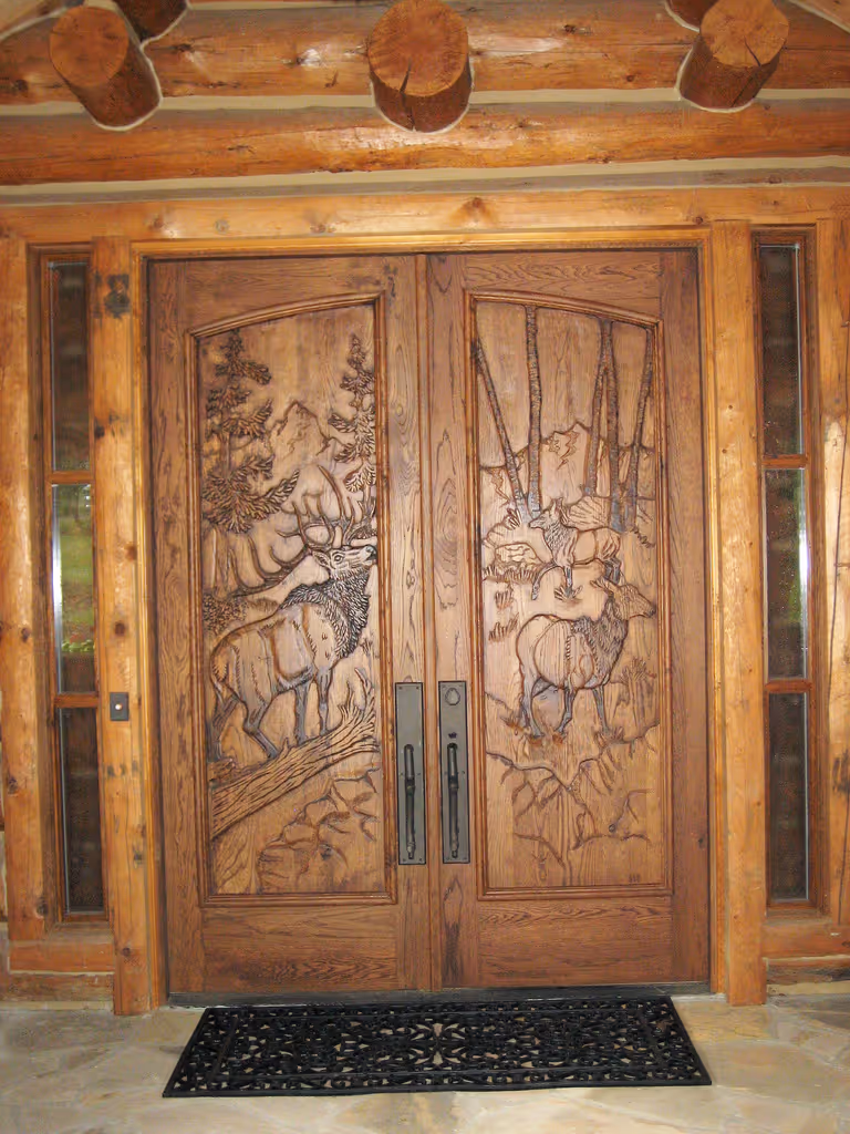 Hand carved elk on entryway